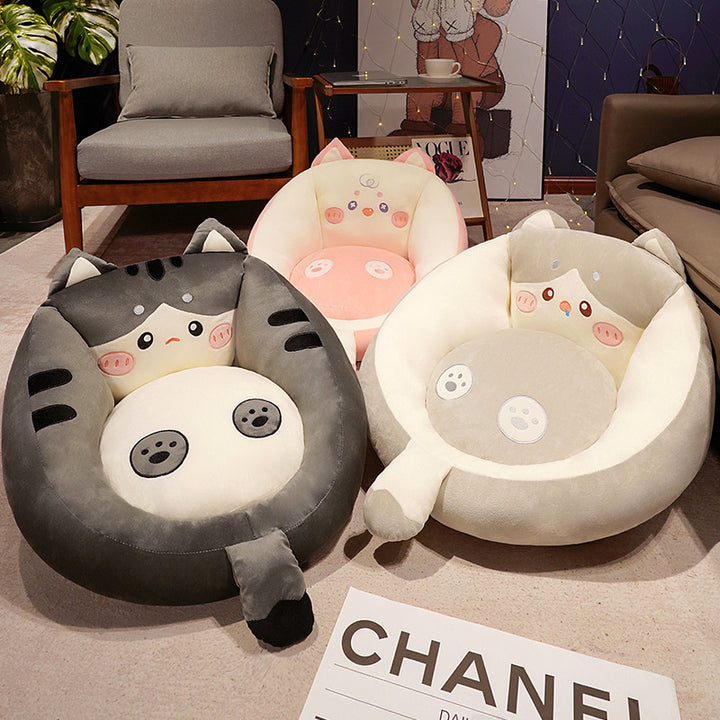Plush pet bed with raised edge and removable cuddly pillow