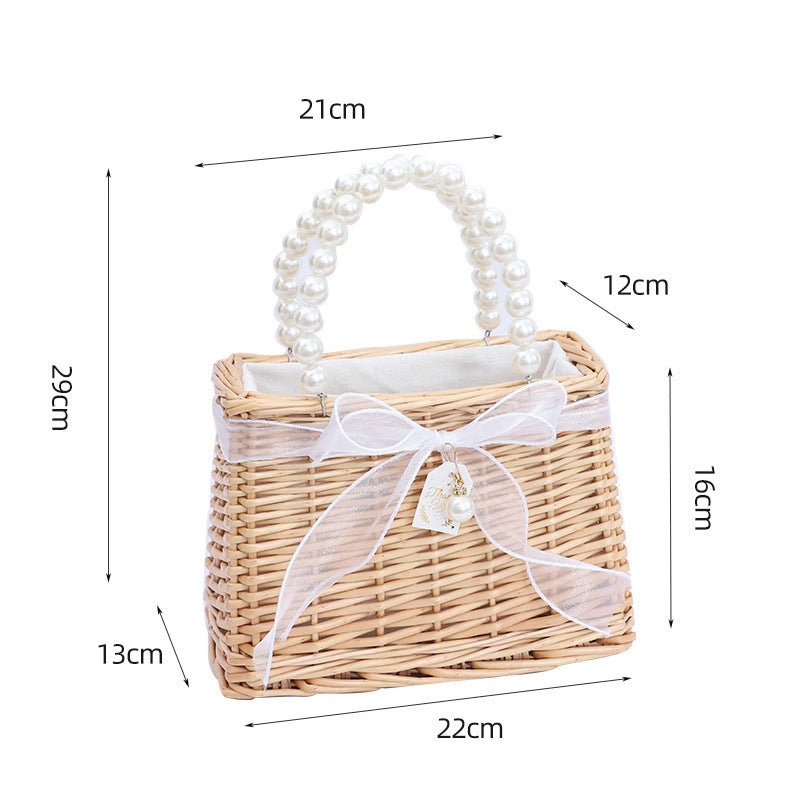 Ladies handbag made of braided material with elegant pearl handles Kalsten