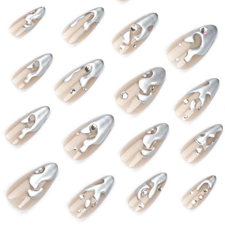 Artful artificial nails with glitter and metallic accents Kalsten