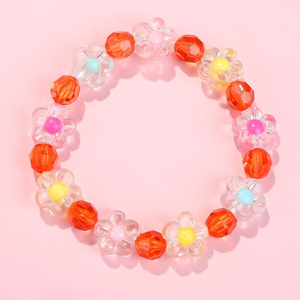 Friendship bracelet with colorful flower motifs Kalsten