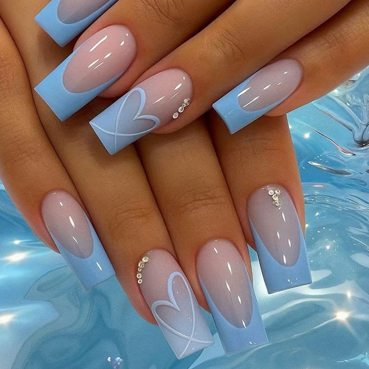 Artificial nail set with romantic heart designs and glamorous accents Kalsten