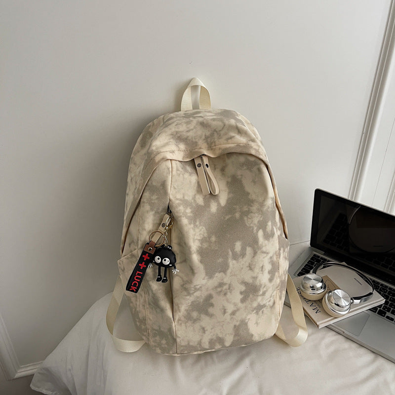 Fashionable backpack with practical design and decorative pendant Kalsten