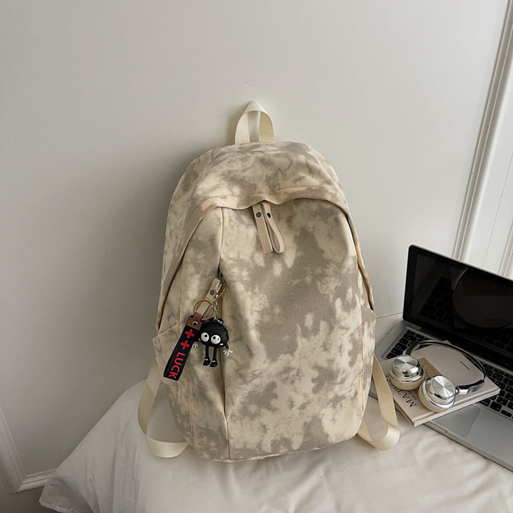 Fashionable backpack with practical design and decorative pendant Kalsten