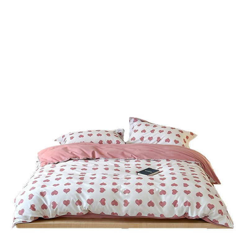 Reversible cotton bedding set with playful sheep print and soft jersey finish