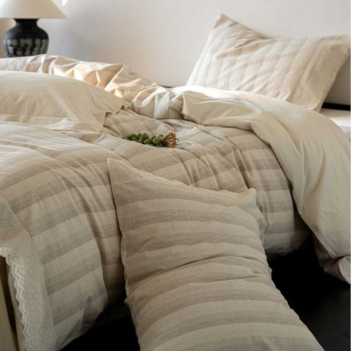 Bedding set with polka dot dobby texture and eyelet embroidery frill