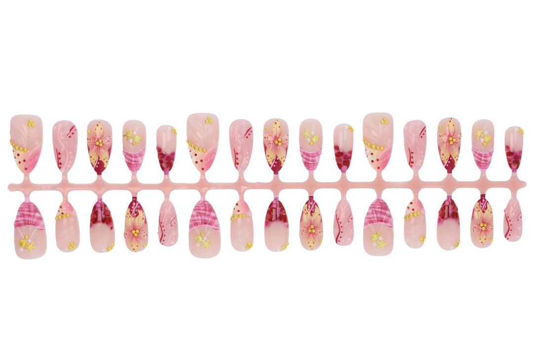 Fake nail set with floral patterns and luxurious embellishments Kalsten