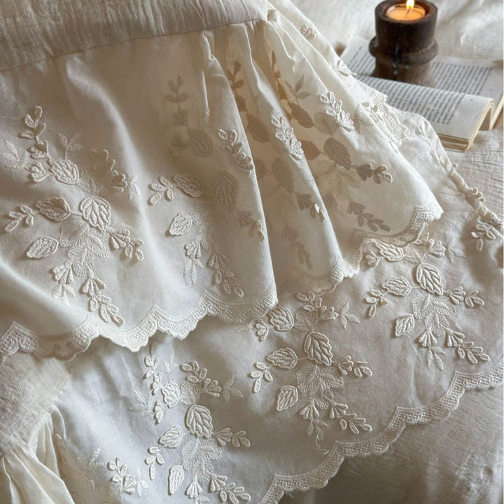 High-quality linen bedding set with floral lace border and ruffle