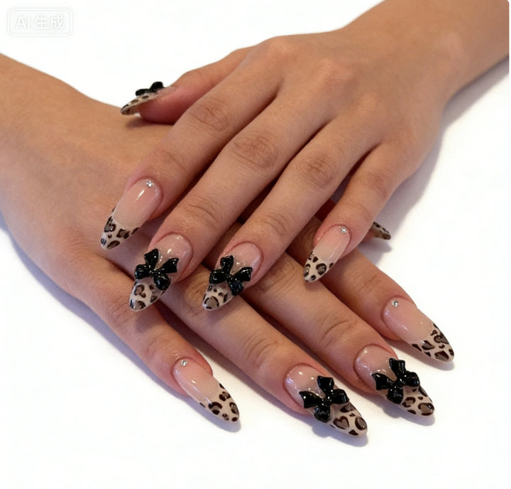 Creative artificial nails with stylish leopard pattern and bow accents Kalsten