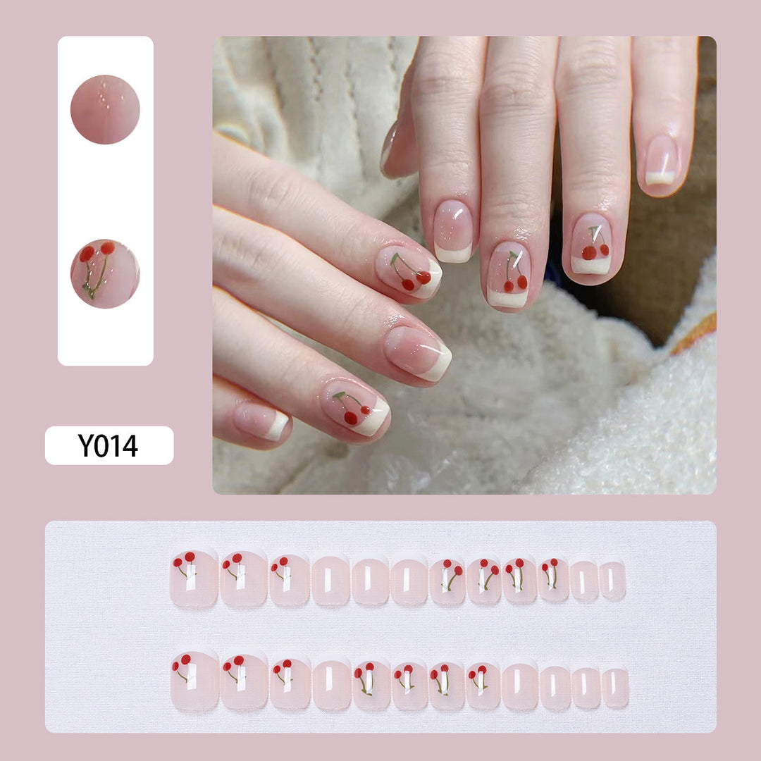 Artistic Press-On Nail Set with Heart and Leaf Designs