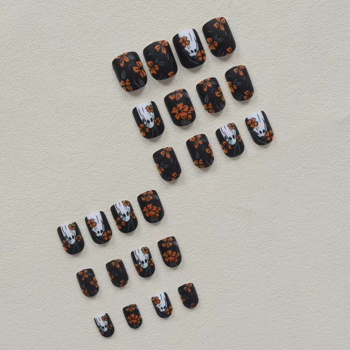 Acrylic nail set with spooky ghost design and floral accents Kalsten