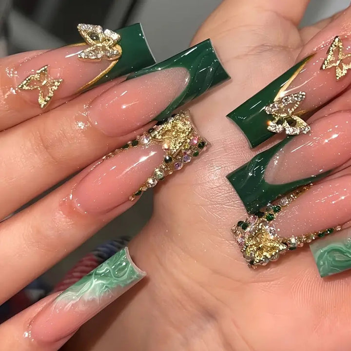 Artistic Press-On Nail Art with Gemstone and Butterfly Accents Kalsten