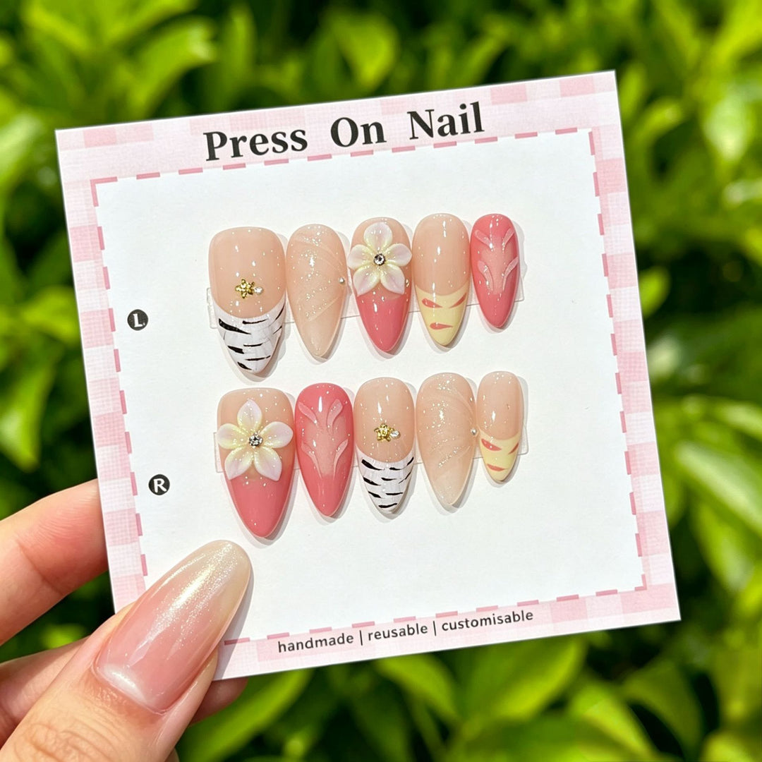 Artistic Press-On Nail Set with Tropical and Floral Accents