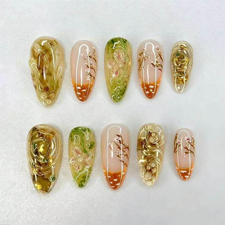 Artistic Press-On Nail Set with Floral and Metallic Design