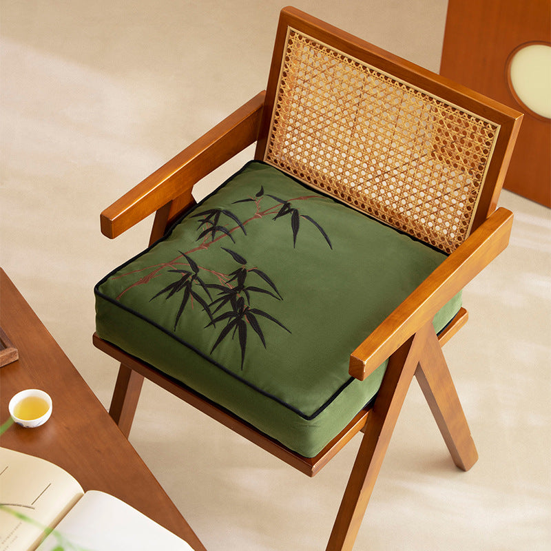 Padded cotton-linen seat cushion with embroidered bamboo motif and contrasting piping Kalsten