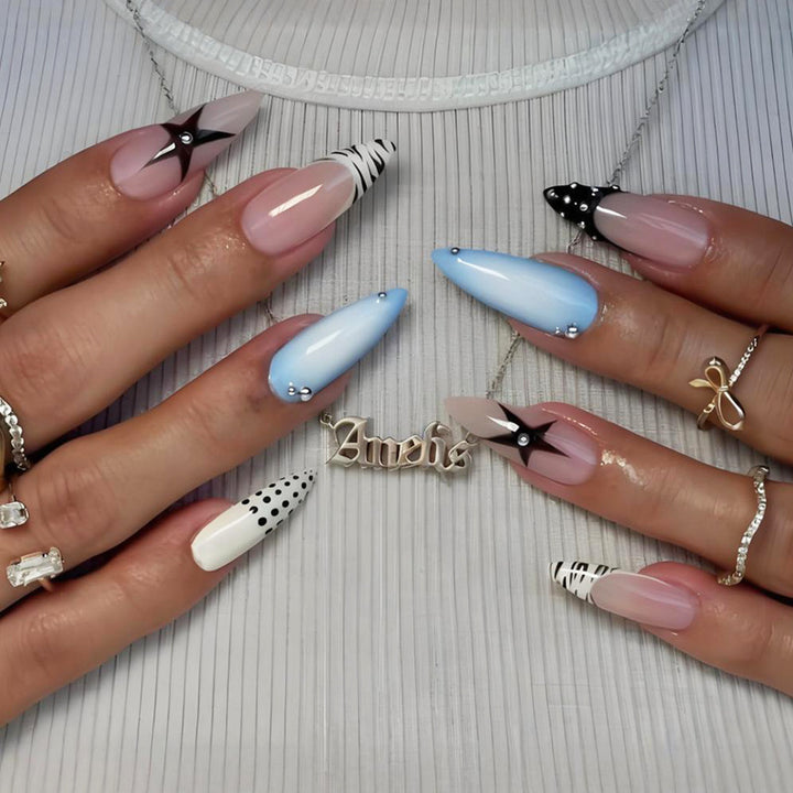 Acrylic nail set with stylish geometric designs and glamorous accents Kalsten