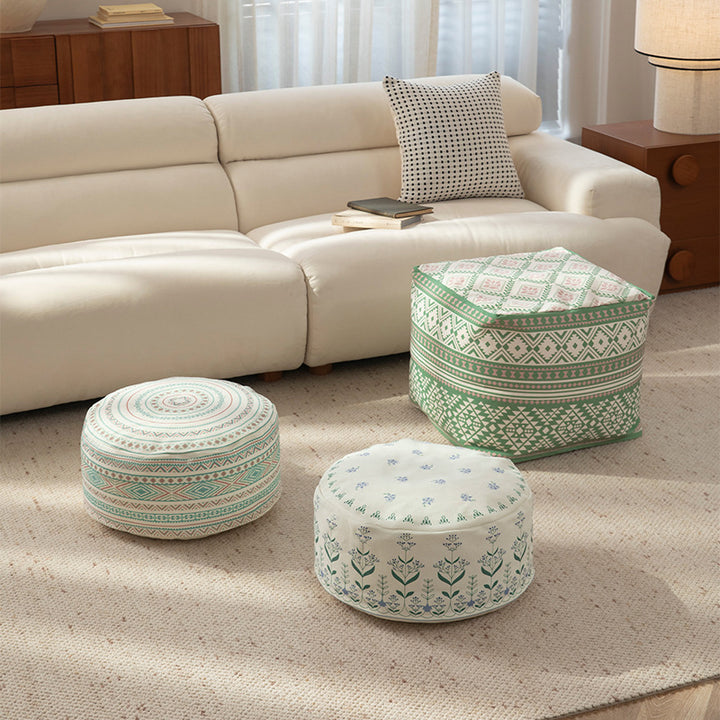 Round floor pouf with ethnic weaving pattern and practical carrying handle Kalsten