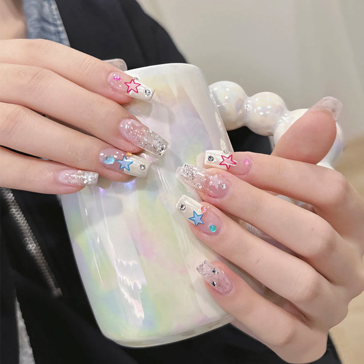 Artificial nails in creative moon and star design Kalsten