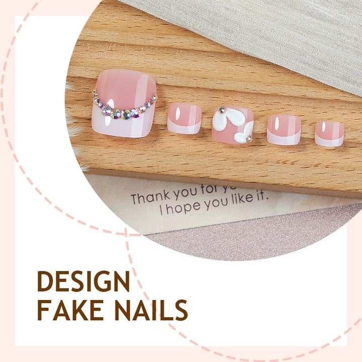 Creative nail art set with elegant flower designs and glitter accents Kalsten