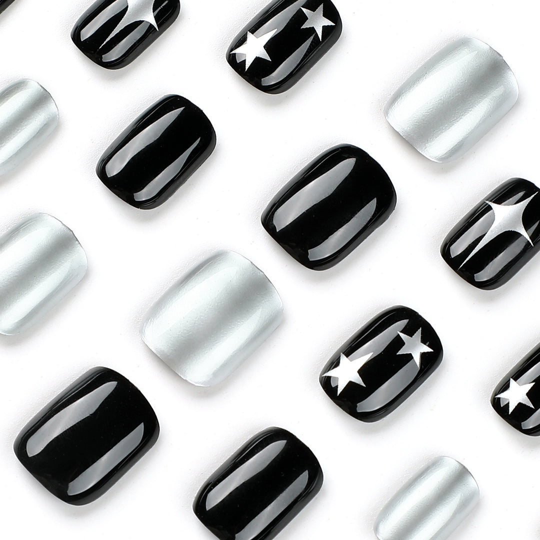 Artful Nail Art with Metallic and Star Motifs Kalsten