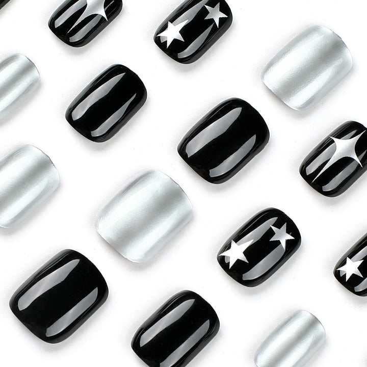 Artful Nail Art with Metallic and Star Motifs Kalsten