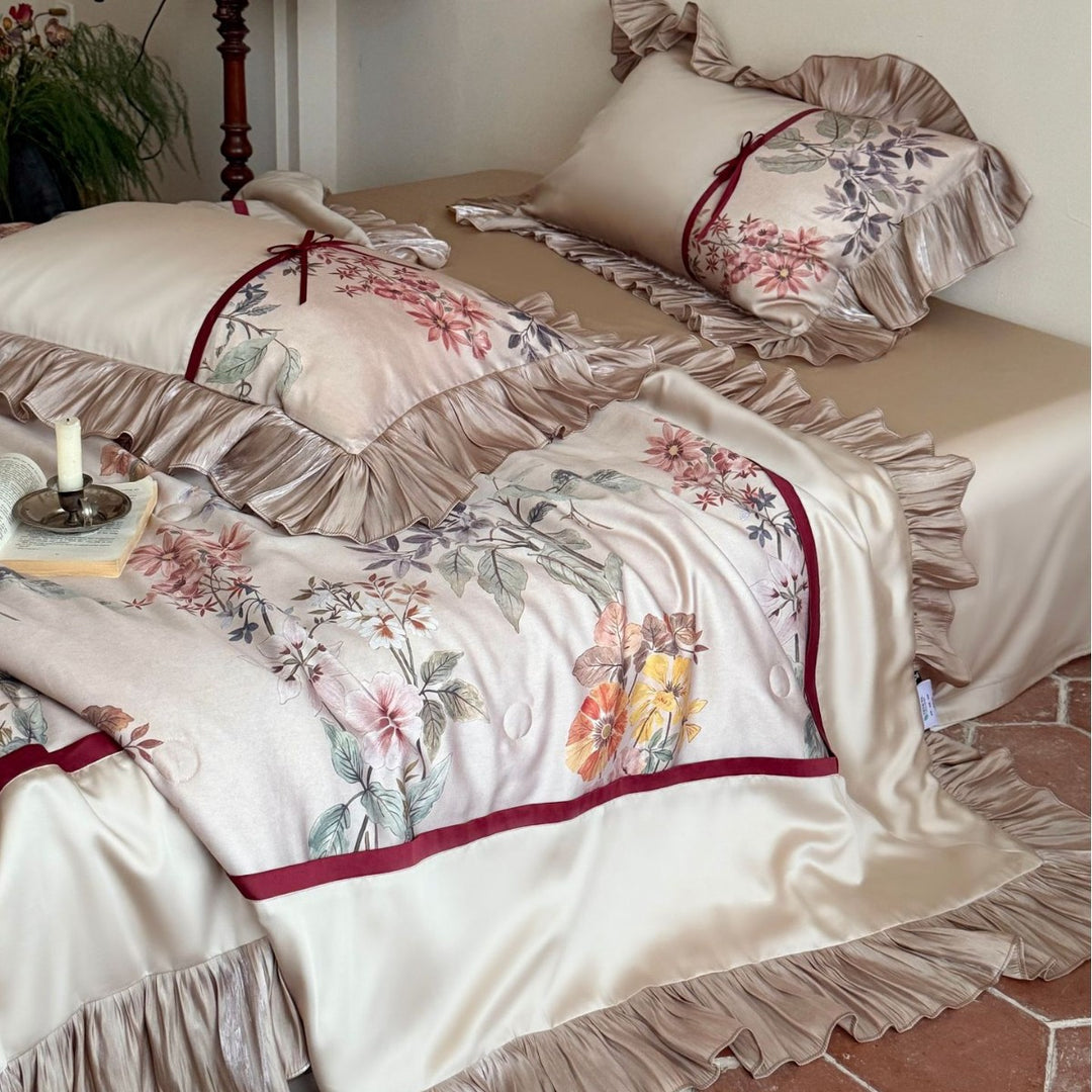 Romantic satin bedding set with ruffles, floral embroidery and reversible function