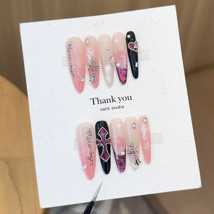 Artificial nails with glamorous accents and sparkling embellishments Kalsten