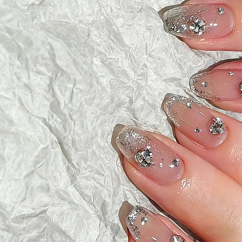 Acrylic nail set with extravagant glitter and crystal embellishments Kalsten