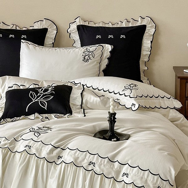 Elegant cotton satin bedding set with contrasting edge embroidery and frill