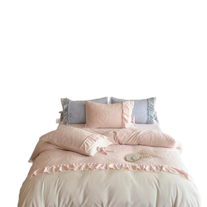 Romantic cotton satin bedding set with ruffled hem and fine tone-on-tone embroidery