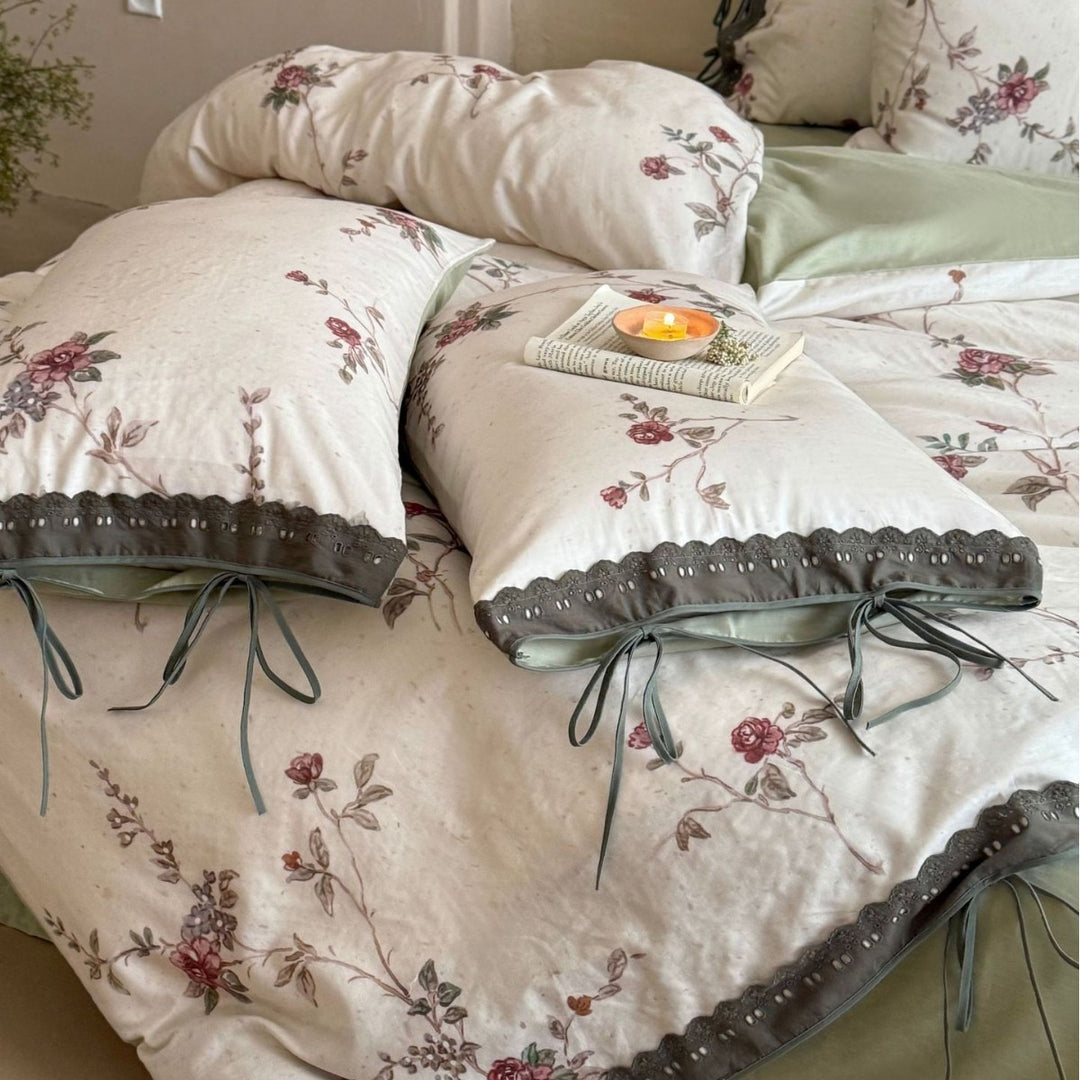 Percale bedding set with floral vintage embroidery, lace trim, and ties
