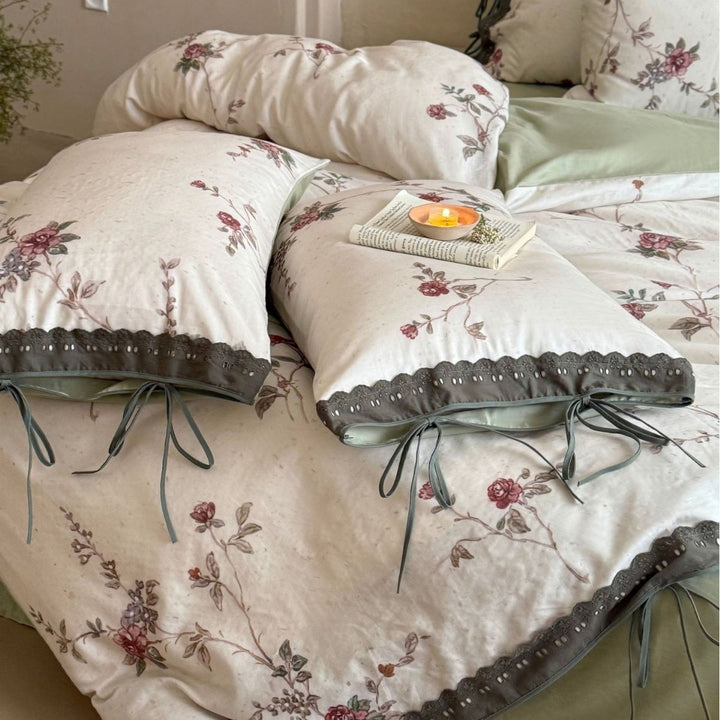 Percale bedding set with floral vintage embroidery, lace trim, and ties