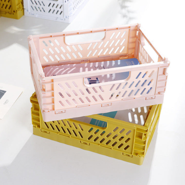 Foldable multi-purpose transport box with ventilation profile and ergonomic grip recesses