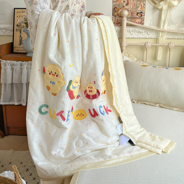 Reversible Children's Quilt with Embroidered Chick Designs