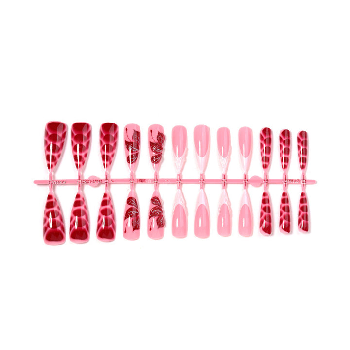 Artificial nail creations with creative patterns and glitter accents Kalsten