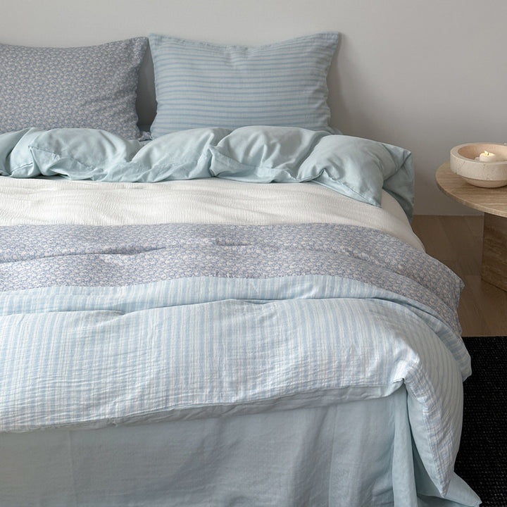 Luxurious cotton satin bedding set with striped and floral patchwork