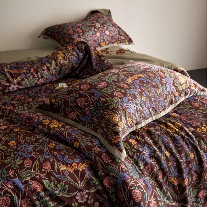 Luxurious satin bedding set with floral and berry design