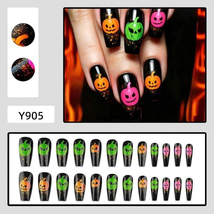 Halloween-style artificial nails with graphic pumpkin designs Kalsten