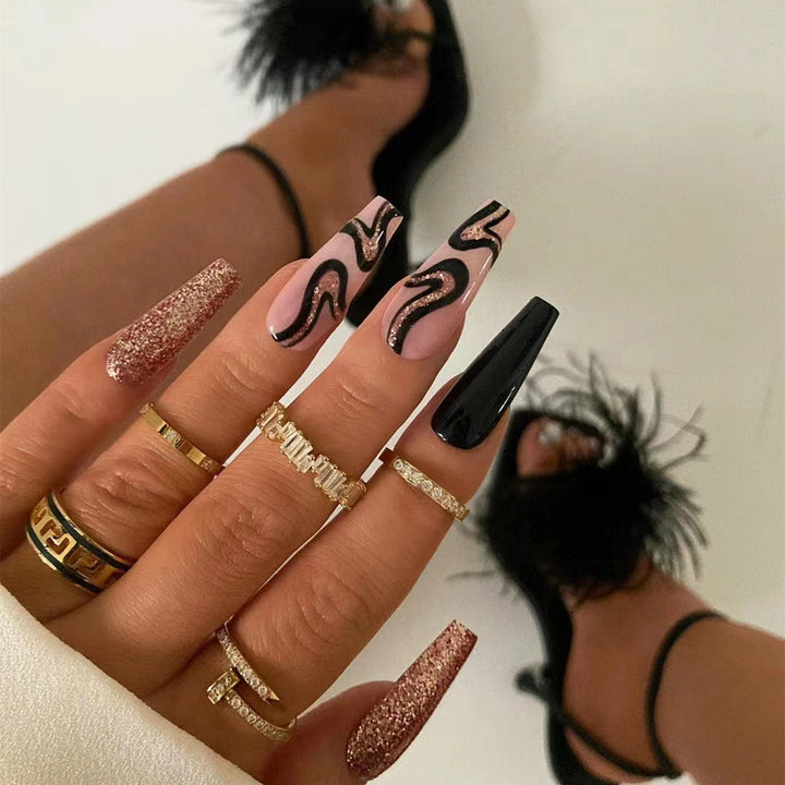 Artistic Press-On Nail Set with Glitter and Abstract Designs