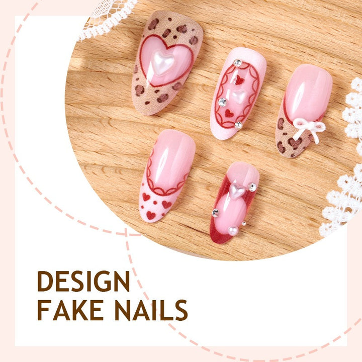 Artificial nail set with romantic heart designs and glamorous 3D details Kalsten