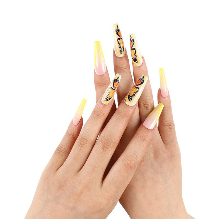 Art nails with butterfly motif Kalsten
