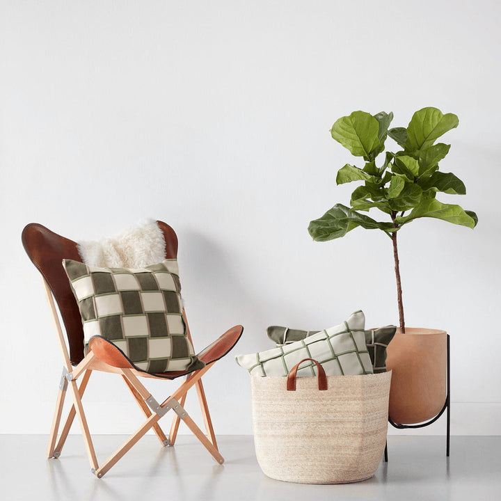 woven decorative pillow with braided square pattern