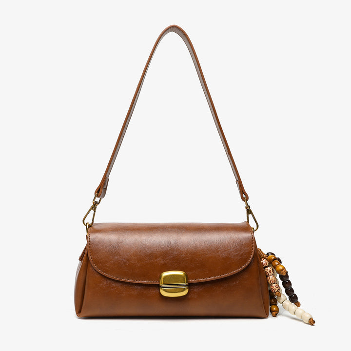 Elegant Handheld Shoulder Bag with Decorative Beaded Charm