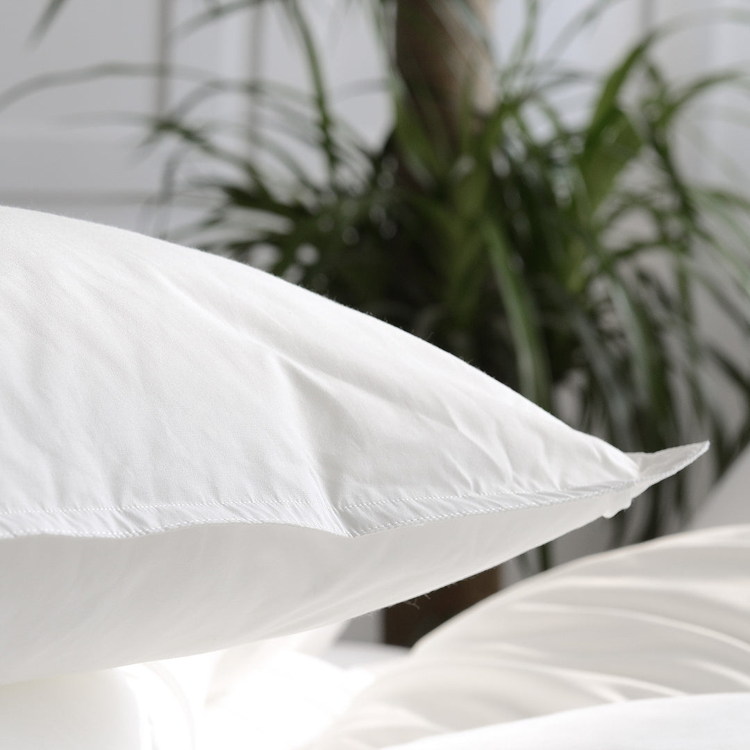 Lightweight all-season duvet with hypoallergenic hollow fiber filling and box chamber quilting