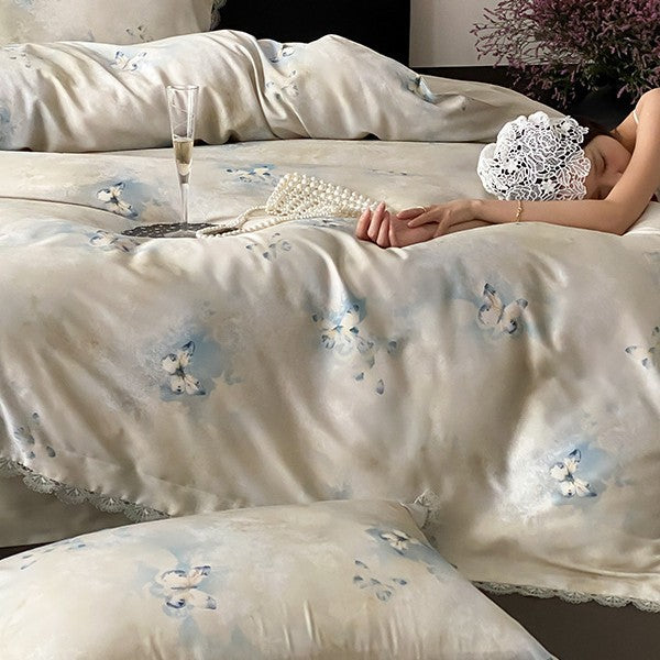 Premium bedding made of fine satin with watercolored floral design and lace edge