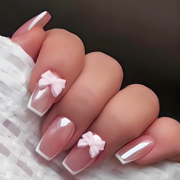 Artificial nail set with stylish bows and elegant French tips Kalsten
