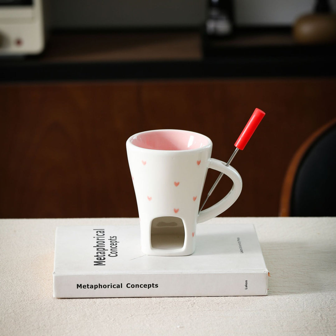 Ceramic mug with integrated tea strainer and silicone drinking straw