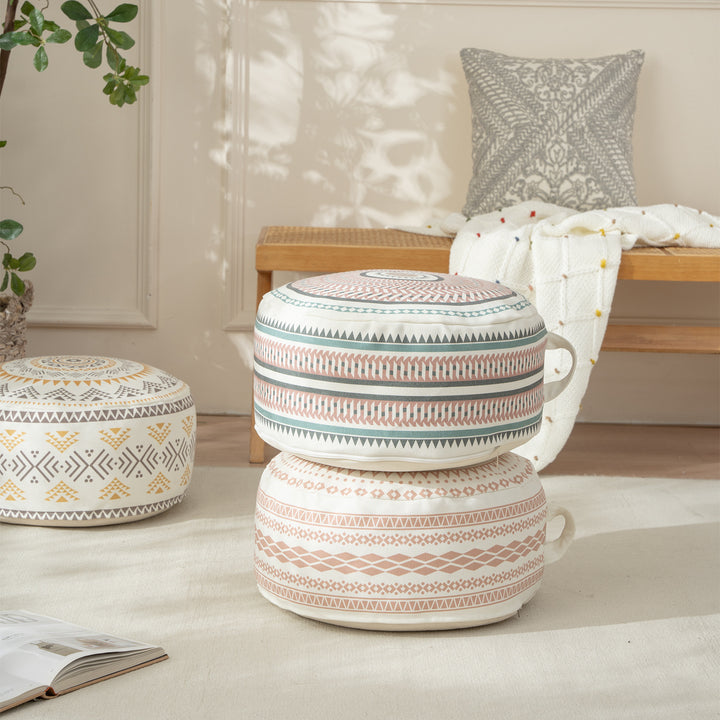 Round padded floor seat pouf with woven ethnic pattern and carrying handle Kalsten