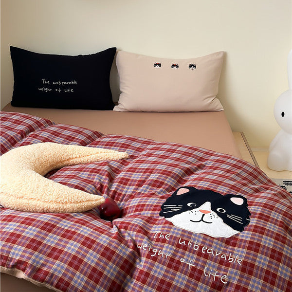 Children's bedding set in retro check with appliquéd bear motif and soft cotton blend fabric
