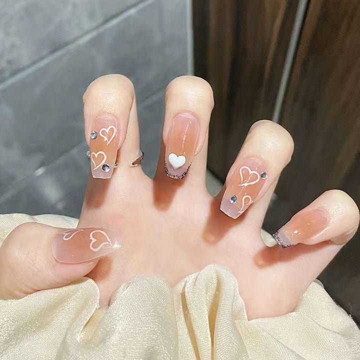Artful nail tips in heart design Kalsten