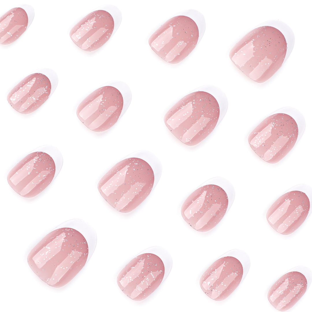 Artful nail art with glitter in gentle tones and elegant tips Kalsten